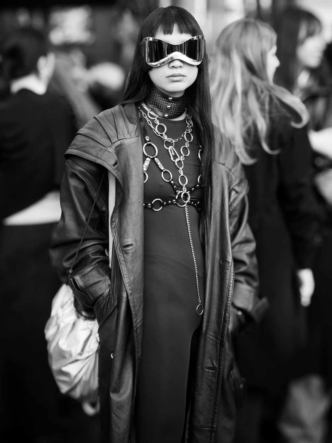 picture of a woman wearing a cool leather outfit and cool sunglasses