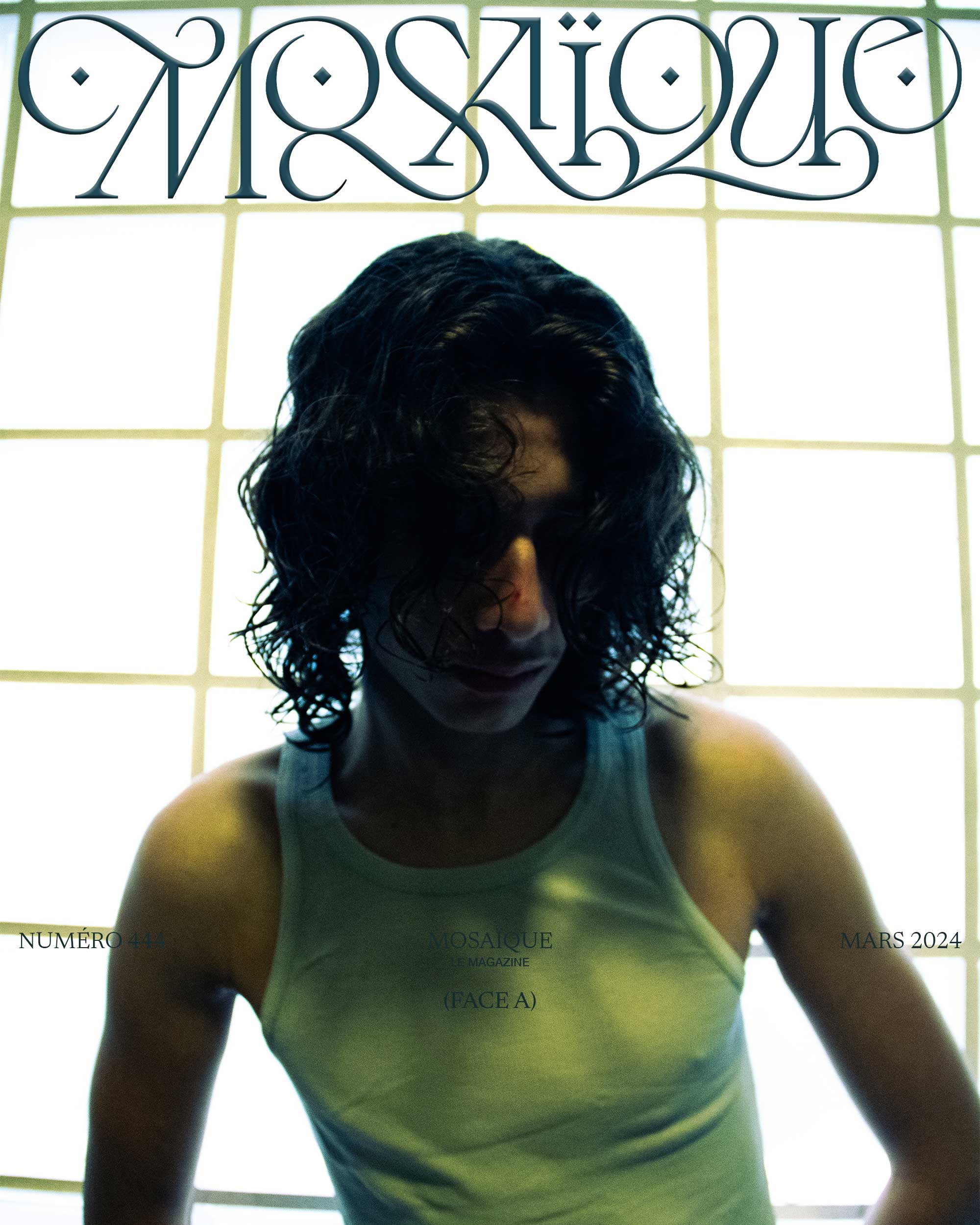 a man in a bathroom with blue lights, cover of mosaique magazine