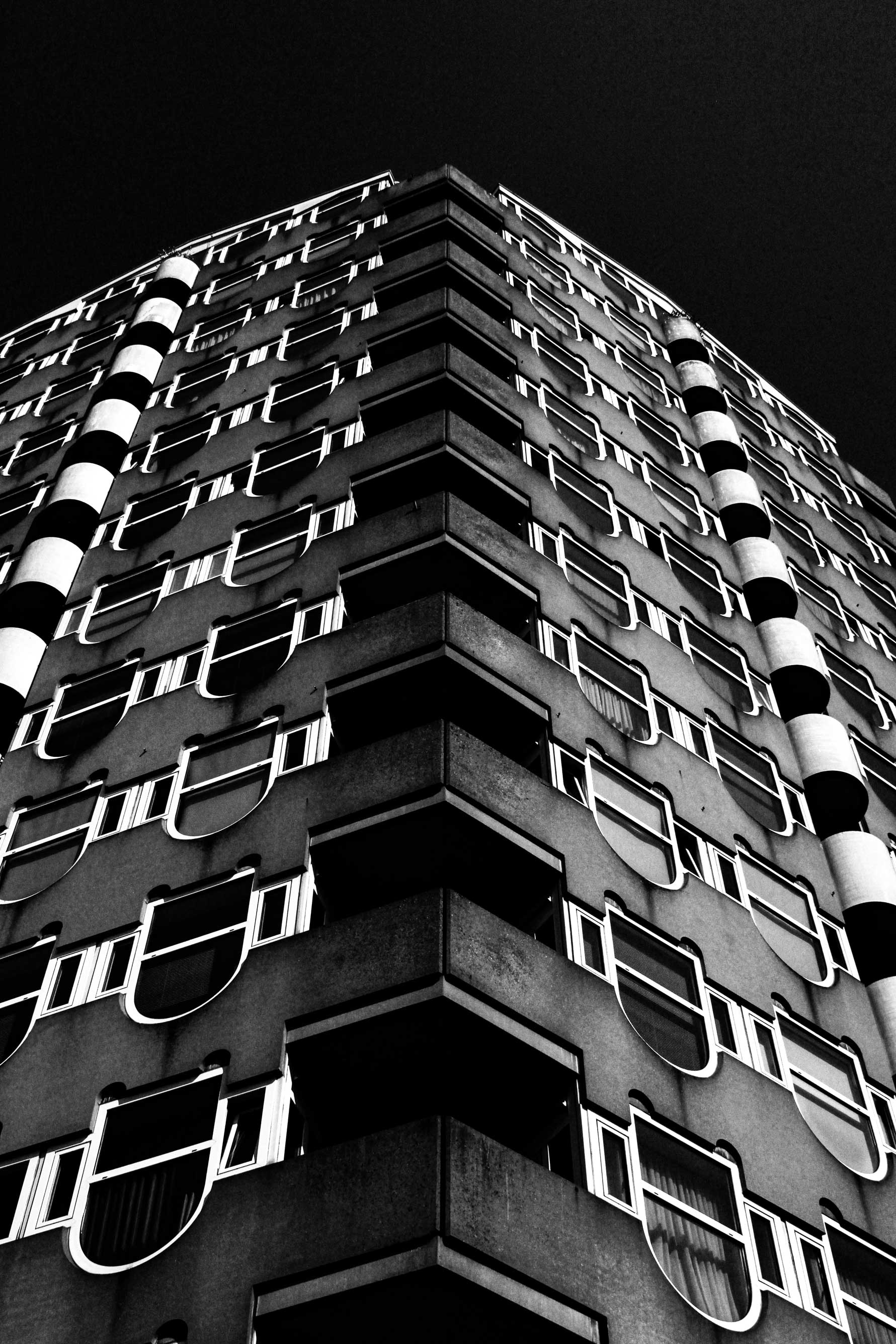 photo of a building in rotterdam in black and white