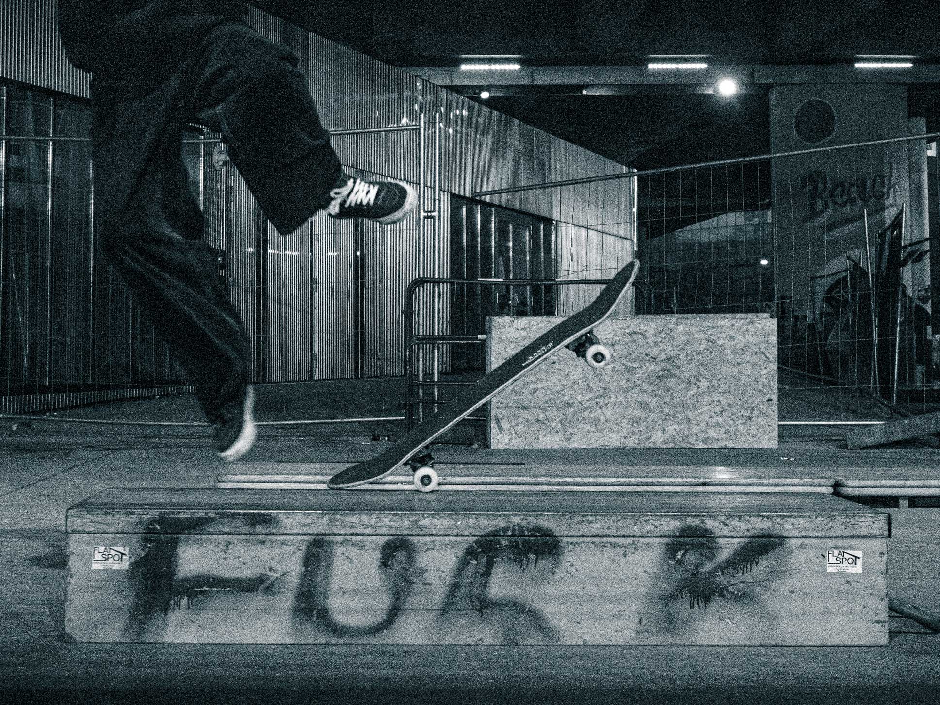 photo of a skatepark and someone is falling